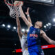 Nighael Ceaser de la U-BT Cluj-Napoca blocat de Dordije Jovanovic de la Budućnost VOLI Podgorica in partida din ABA League, BT Arena, Cluj, FOTO/ Andrei Apolzan/SportPulse