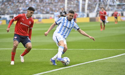 Adrian Martinez from Racing Club and Sebastian Valdez from Independiente during the Torneo Clausura 2026 Matchweek 13 fixture between Racing Club and Independiente at Estadio Presidente Perón in Avellaneda, Buenos Aires Province, Argentina, on 18 October 2026. PHOTO / Julio Martin Mancini / SportPulse